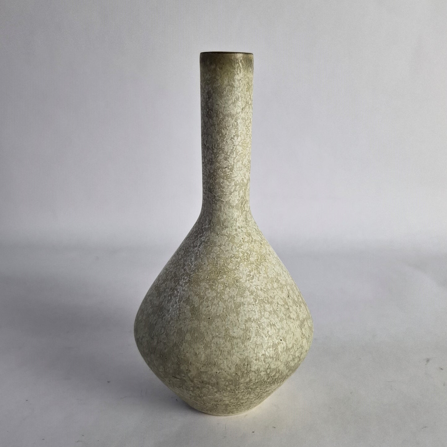 Stoneware vase in unusual pale glaze.