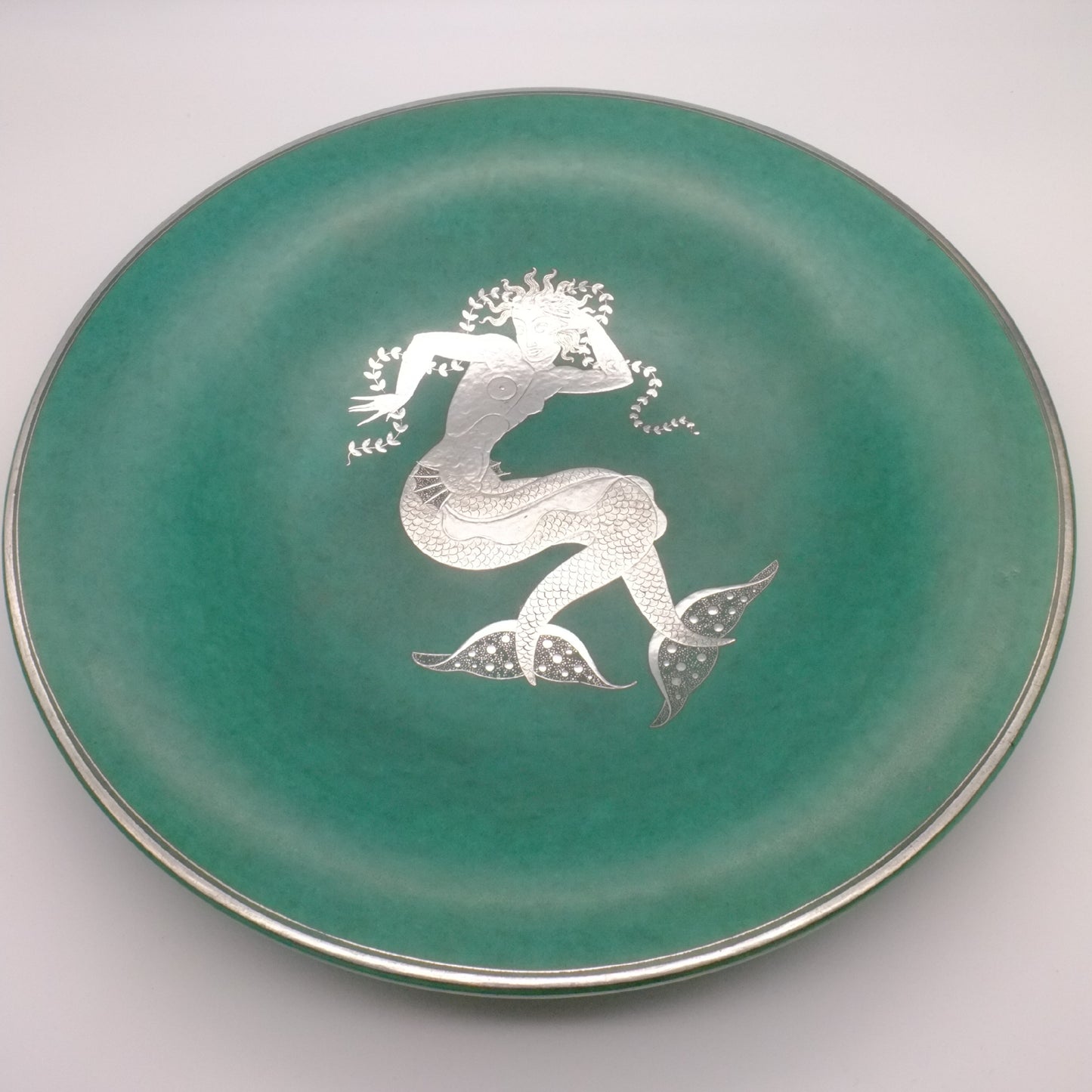 "Argenta" stoneware charger designed by Wilhelm Kage for Gustvasberg, Sweden, 1943.