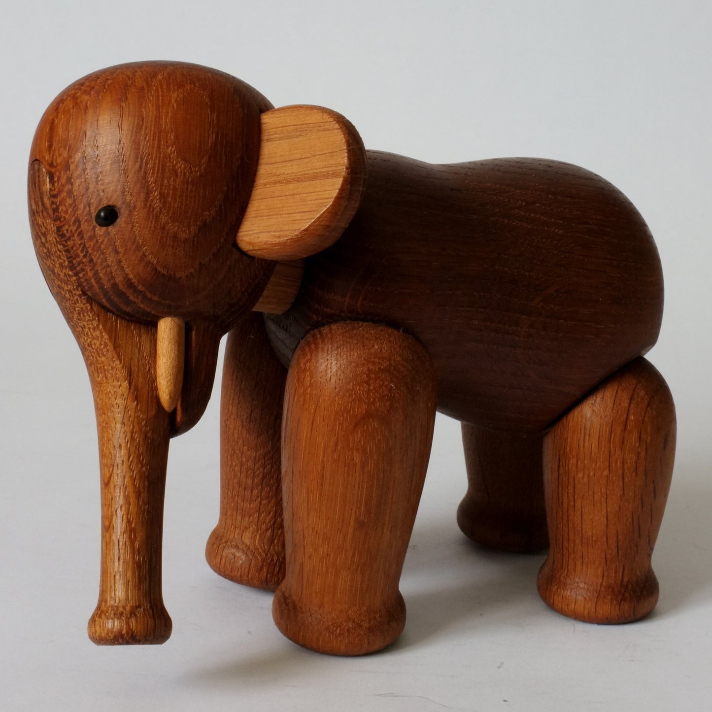 Wooden toy elephant with semi-articulated limbs, designed by Kay Bojesen.