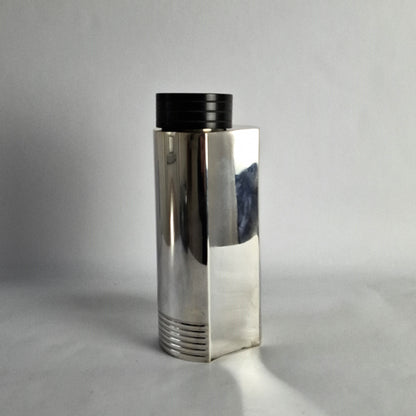 Silver plated cocktails shaker with phenolic lid.