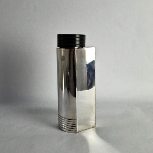 Silver plated cocktails shaker with phenolic lid.