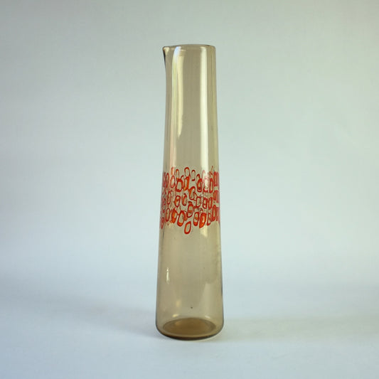 A tall, pale tea colored glass vase with a band of red murrines, and a pulled beak rim.