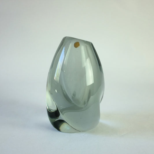 Thick glass vase with internal smoke haze decoration in asymmetric form.