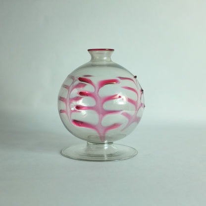 Rare vase with applied palm leaf decoration on spherical body an a flat, round foot.