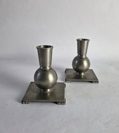 A pair of pewter candlesticks in Swedish grace style.