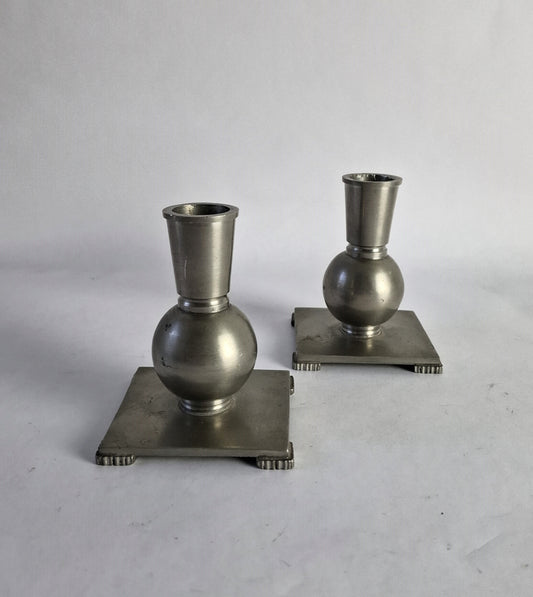 A pair of pewter candlesticks in Swedish grace style.